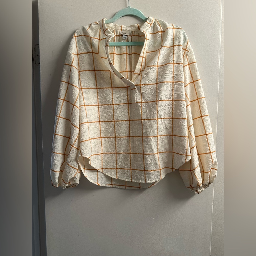 Size small: Business shirt that’s cream colored. Gently worn.